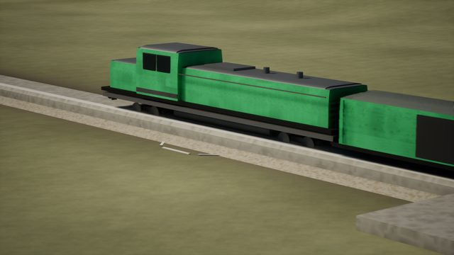 Close view of a green diesel locomotive and boxcar on a raised track bed